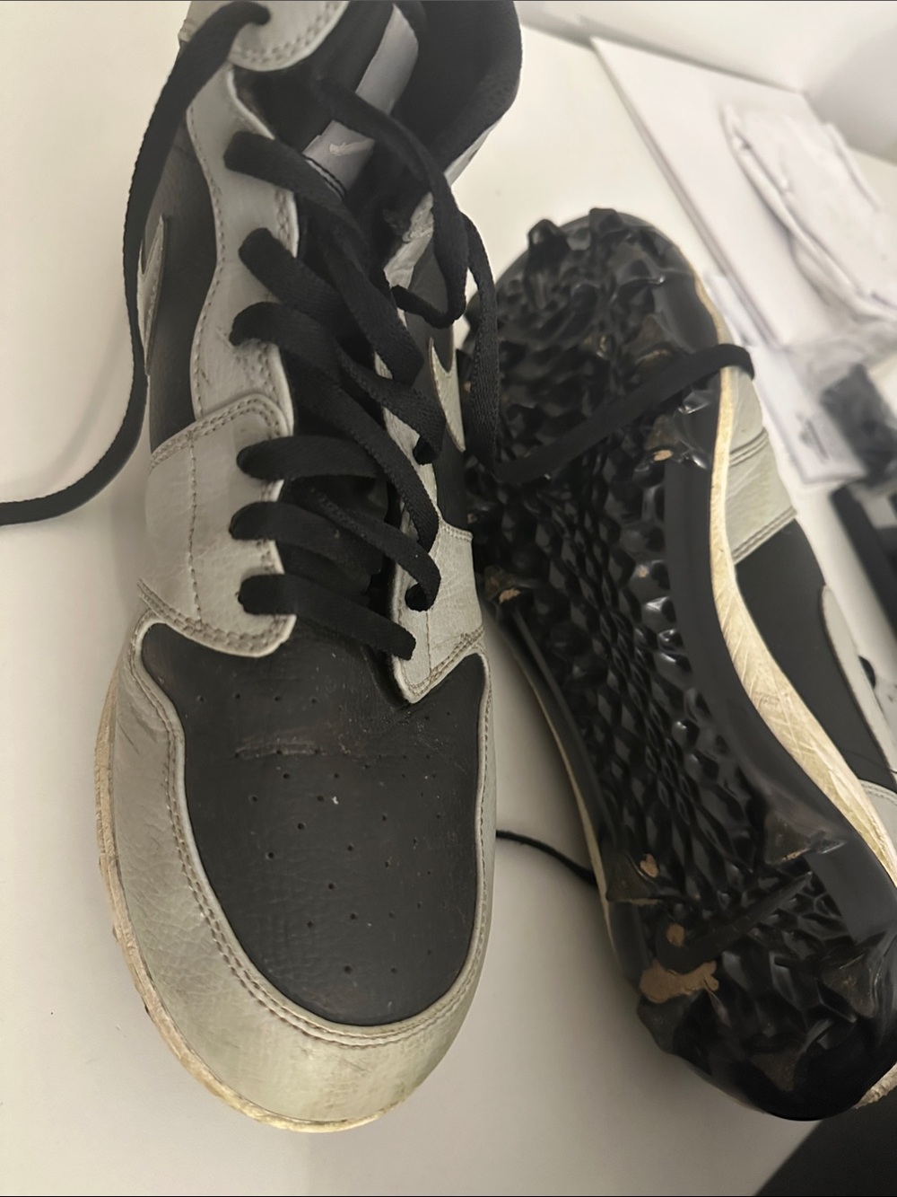 Jordan Men’s Black and Cream Athletic Low-Top Football Cleats
